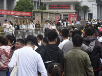 Students are walking into a test room outside Qingjiang Middle School College entrance examination site of the 2024 National College Entranc...