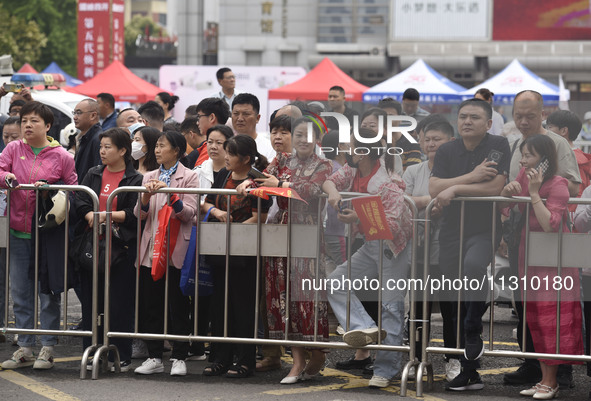 Students are walking into a test room outside Qingjiang Middle School College entrance examination site of the 2024 National College Entranc...