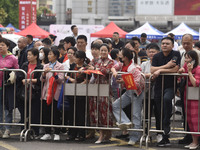 Students are walking into a test room outside Qingjiang Middle School College entrance examination site of the 2024 National College Entranc...