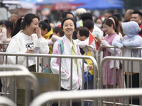 Students are walking into a test room outside Qingjiang Middle School College entrance examination site of the 2024 National College Entranc...