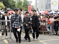 Students are walking into a test room outside Qingjiang Middle School College entrance examination site of the 2024 National College Entranc...