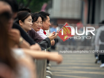 Students are walking into a test room outside Qingjiang Middle School College entrance examination site of the 2024 National College Entranc...