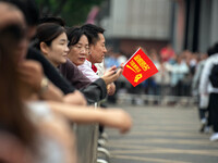 Students are walking into a test room outside Qingjiang Middle School College entrance examination site of the 2024 National College Entranc...