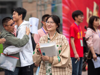 Students are walking into a test room outside Qingjiang Middle School College entrance examination site of the 2024 National College Entranc...