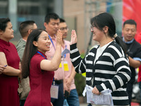 Students are walking into a test room outside Qingjiang Middle School College entrance examination site of the 2024 National College Entranc...