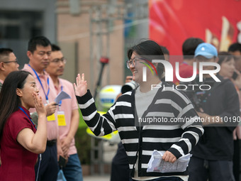 Students are walking into a test room outside Qingjiang Middle School College entrance examination site of the 2024 National College Entranc...