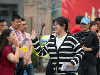 Students are walking into a test room outside Qingjiang Middle School College entrance examination site of the 2024 National College Entranc...