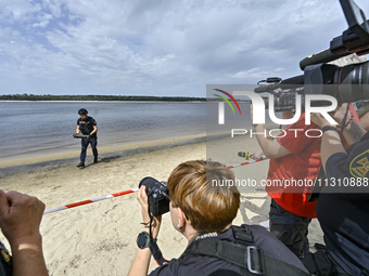 Journalists are filming the head of the Special Pyrotechnics Department of the Main Directorate of the State Emergency Service in Zaporizhzh...