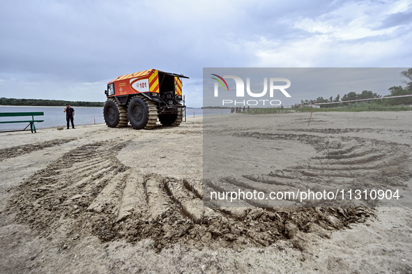 A Bohun-2 snowmobile is being pictured on the beach during the training of State Emergency Service personnel to improve their skills in sear...