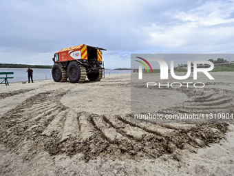 A Bohun-2 snowmobile is being pictured on the beach during the training of State Emergency Service personnel to improve their skills in sear...