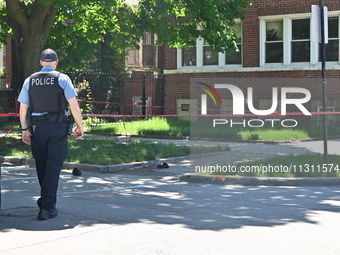 Shoes, blood, and clothing are being found at the crime scene. Two people are being shot in Chicago, Illinois, United States, on June 7, 202...