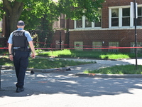 Shoes, blood, and clothing are being found at the crime scene. Two people are being shot in Chicago, Illinois, United States, on June 7, 202...