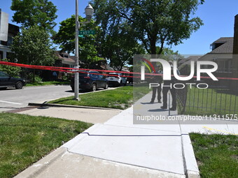 Chicago police are guarding the crime scene where two people are found shot in Chicago, Illinois, United States, on June 7, 2024. At approxi...