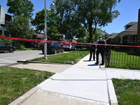 Chicago police are guarding the crime scene where two people are found shot in Chicago, Illinois, United States, on June 7, 2024. At approxi...