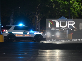 A 16-year-old male is being shot while standing in the parking lot of a fast food restaurant in Chicago, Illinois, United States, on June 7,...