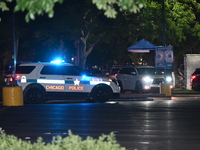 A 16-year-old male is being shot while standing in the parking lot of a fast food restaurant in Chicago, Illinois, United States, on June 7,...