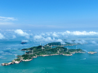 A wind farm is being seen on Luhua Island in Zhoushan city, Zhejiang province, China, on June 8, 2024. June 8, 2024, is World Oceans Day. (