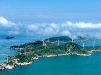 A wind farm is being seen on Luhua Island in Zhoushan city, Zhejiang province, China, on June 8, 2024. June 8, 2024, is World Oceans Day. (