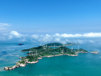 A wind farm is being seen on Luhua Island in Zhoushan city, Zhejiang province, China, on June 8, 2024. June 8, 2024, is World Oceans Day. (