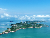 A wind farm is being seen on Luhua Island in Zhoushan city, Zhejiang province, China, on June 8, 2024. June 8, 2024, is World Oceans Day. (