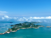 A wind farm is being seen on Luhua Island in Zhoushan city, Zhejiang province, China, on June 8, 2024. June 8, 2024, is World Oceans Day. (