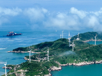 A wind farm is being seen on Luhua Island in Zhoushan city, Zhejiang province, China, on June 8, 2024. June 8, 2024, is World Oceans Day. (