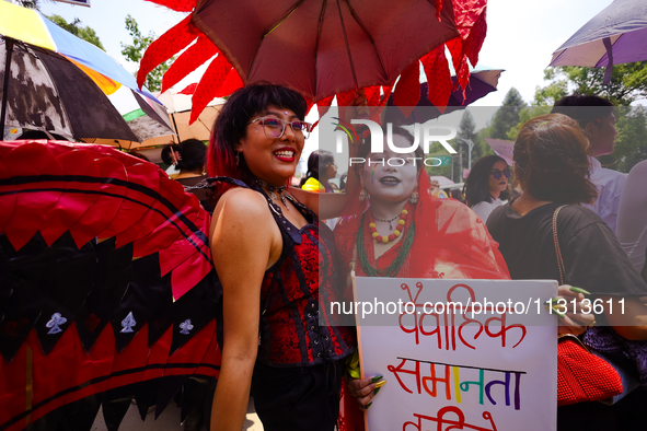 Participants of the 6th Nepal Pride Parade are dancing in the streets of Kathmandu as they rally through the streets of Kathmandu in Kathman...