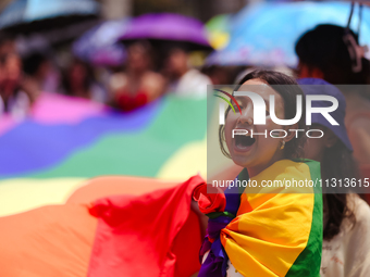 A Nepali participant is chanting slogans demanding rights for sexual minority groups of Nepal while taking part in the 6th Nepal Pride Parad...