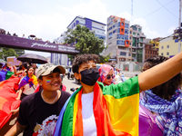 Participants are taking a selfie while attending the 6th Nepal Pride Parade in Kathmandu, Nepal, on June 8, 2024. Hundreds of members of mar...
