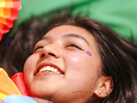A participant is taking part in the annual Nepal Pride Parade in Kathmandu, Nepal, on June 8, 2024. Hundreds of members of marginalized sexu...