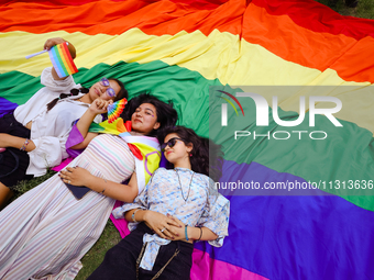 Participants are taking part in the annual Nepal Pride Parade in Kathmandu, Nepal, on June 8, 2024. Hundreds of members of marginalized sexu...