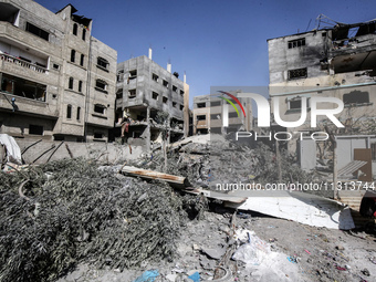 A view is showing destroyed buildings following operations by the Israeli Special Forces in the Nuseirat camp, in the central Gaza Strip, on...