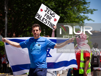 A pro-Israel counter-protester attends a pro-Palestine demonstration at the White House without incident, Washington, DC, June 8, 2024.  Tho...