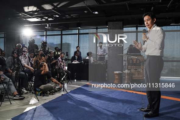 Former leader of the Move Forward Party Pita Limjaroenrat is answering questions from the media during a press conference on the party's pla...