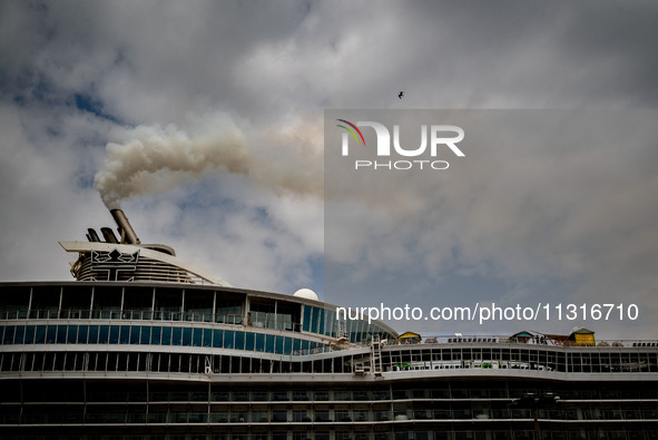 The smokestacks of the Oasis of the Seas cruise ship are giving off smoke in the port of Barcelona, Spain, on June 9, 2024. Sulphur oxide an...