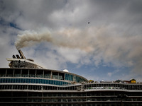 The smokestacks of the Oasis of the Seas cruise ship are giving off smoke in the port of Barcelona, Spain, on June 9, 2024. Sulphur oxide an...