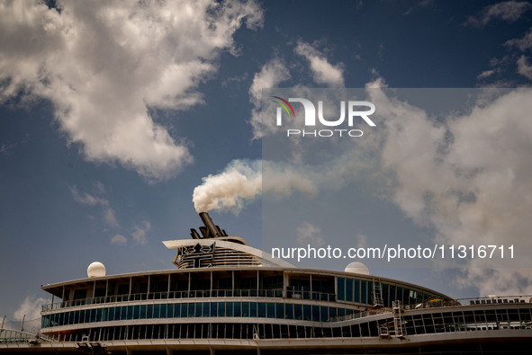 The smokestacks of the Oasis of the Seas cruise ship are giving off smoke in the port of Barcelona, Spain, on June 9, 2024. Sulphur oxide an...