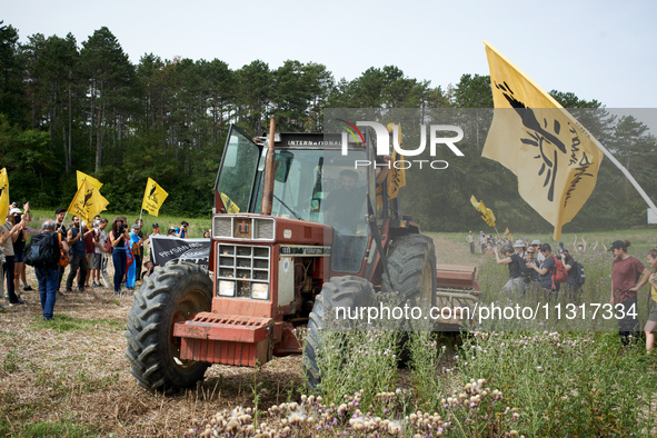 Protesters and members of the Confederation Paysanne are gathering in a field that will be destroyed by the construction of the A69. Nearly...