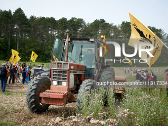 Protesters and members of the Confederation Paysanne are gathering in a field that will be destroyed by the construction of the A69. Nearly...