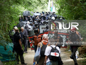 The black bloc is going to an objective of the protest. Nearly 5,000 people are participating in a weekend of action called 'Roue Libre' in...