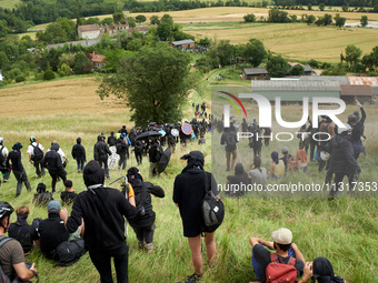 The black bloc is going to an objective of the protest. Nearly 5,000 people are participating in a weekend of action called 'Roue Libre' in...