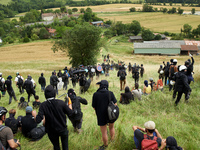 The black bloc is going to an objective of the protest. Nearly 5,000 people are participating in a weekend of action called 'Roue Libre' in...