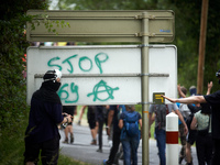 A protester is writing 'Stop to the A69'. Nearly 5,000 people are participating in a weekend of action called 'Roue Libre' in the Tarn depar...