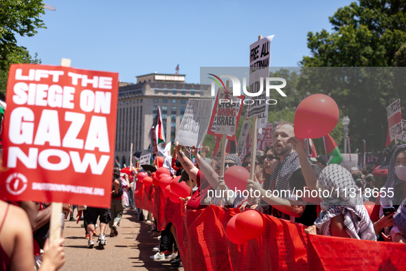 Thousands of pro-Palestinian demonstrators encircle the White House, forming a ‘red line’ to call for an end to the siege of Gaza and Americ...