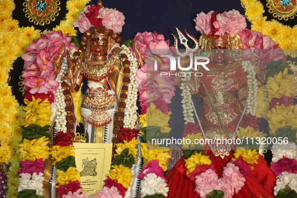 Idols of Hindu deities are being adorned during the 10th night of the Pathirakali Amman festival at the Pathirakali Amman Kovil (Pathirakali...