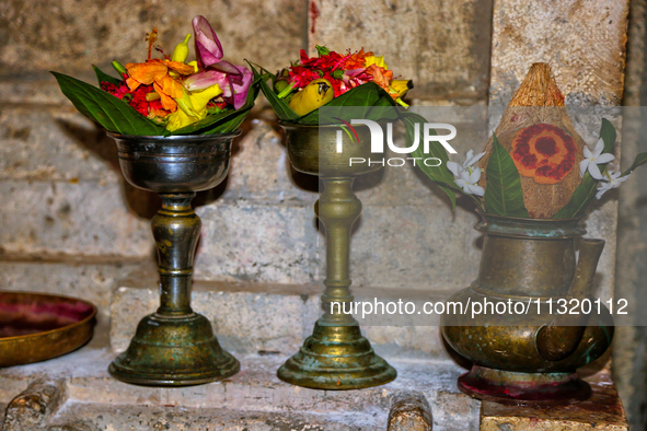 Religious items are being seen during prayers on the 10th night of the Pathirakali Amman festival at the Pathirakali Amman Kovil (Pathirakal...