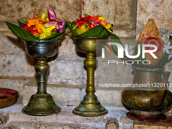 Religious items are being seen during prayers on the 10th night of the Pathirakali Amman festival at the Pathirakali Amman Kovil (Pathirakal...