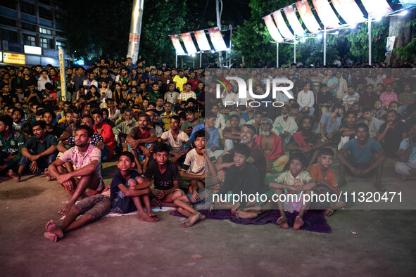 Bangladeshi fans are enjoying a cricket match between Bangladesh and South Africa on a giant screen during the ICC Men's T20 World Cup at TS...