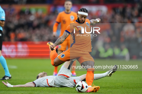 Memphis Depay Centre-Forward of Netherland and Atletico de Madrid shooting to goal during the international friendly match between Netherlan...