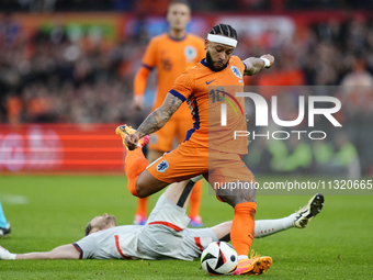 Memphis Depay Centre-Forward of Netherland and Atletico de Madrid shooting to goal during the international friendly match between Netherlan...